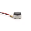 1040 LRA coin-type haptic feedback motor with black dampening foam and lead wires