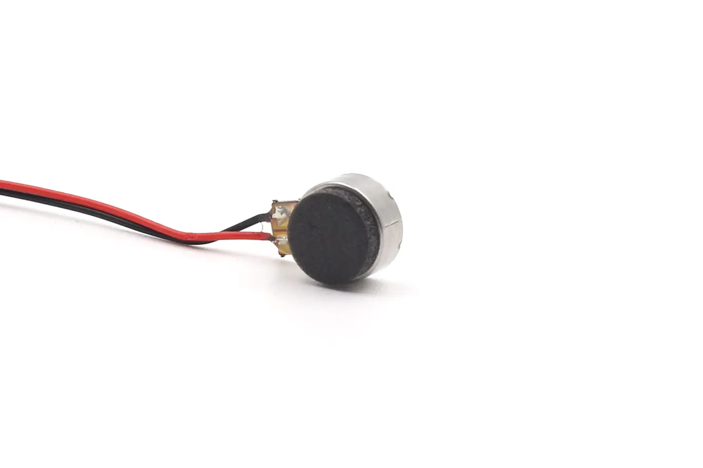 Close-up top view of a circular linear haptic feedback vibration motor