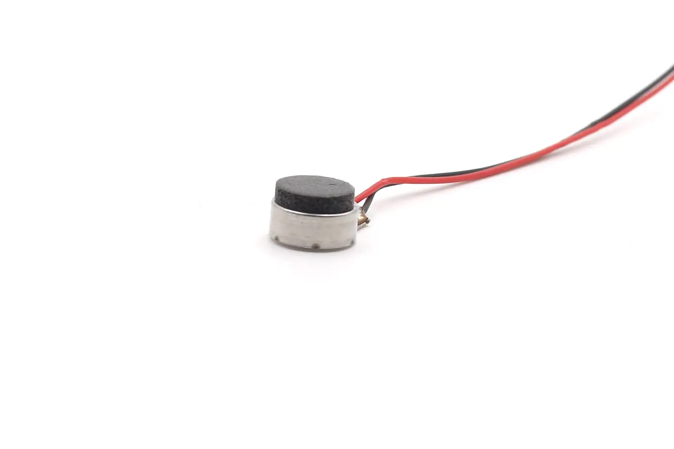 Side profile of a compact 4.05mm coin-type haptic feedback linear motor