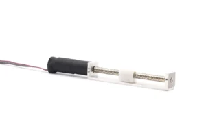 Side view of 12 volt electric linear actuator with TR7 lead screw and white POM slider block