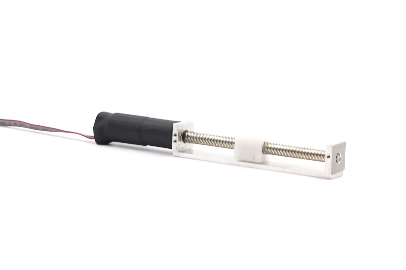 Side view of 12 volt electric linear actuator with TR7 lead screw and white POM slider block